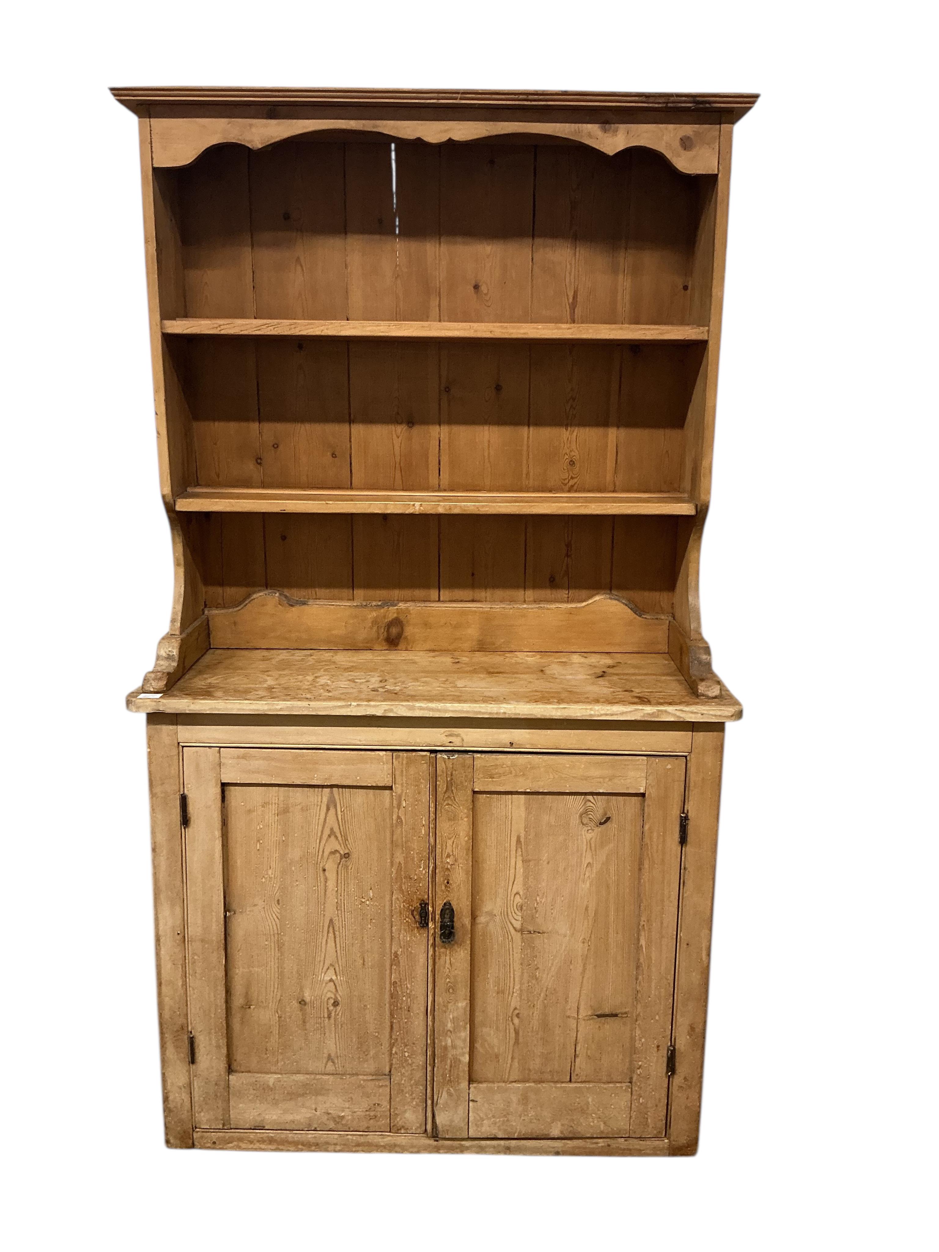 A Victorian pine dresser with associated boarded rack, width 116cm, depth 45cm, height 207cm